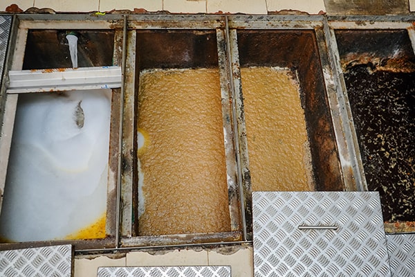 neglecting grease trap maintenance can lead to foul odors, plumbing issues, and health code violations